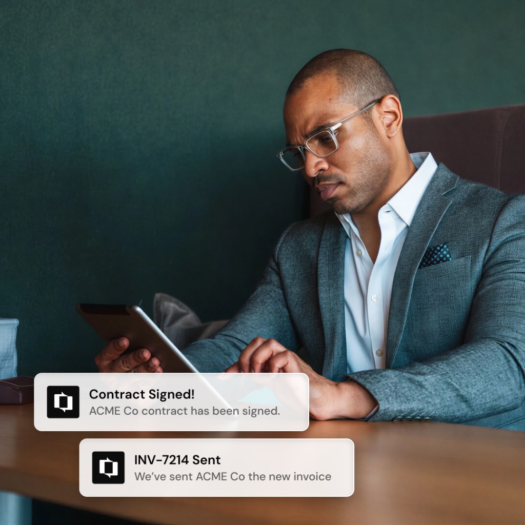 Sales professional reviewing a signature request on a tablet