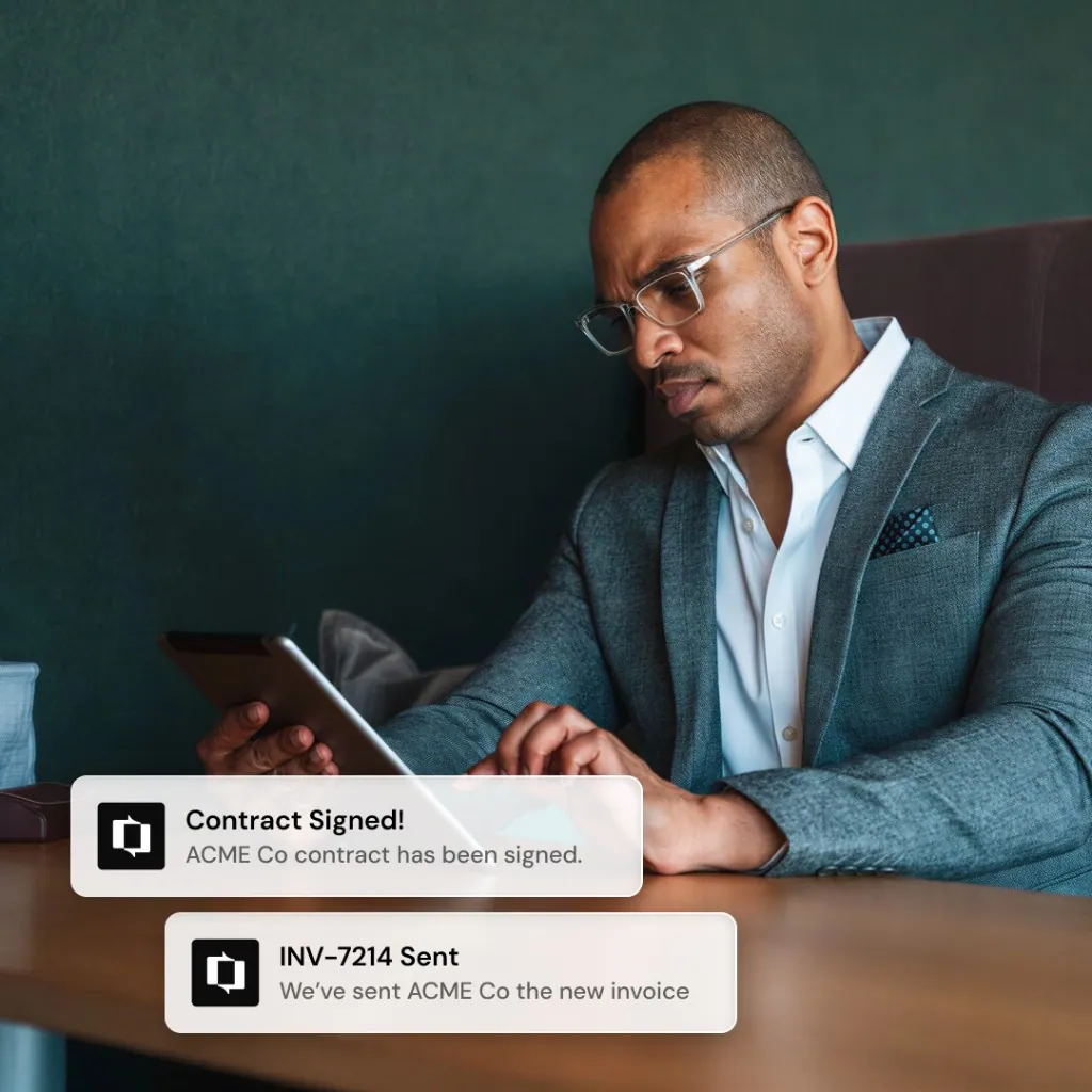 Sales professional reviewing a signature request on a tablet